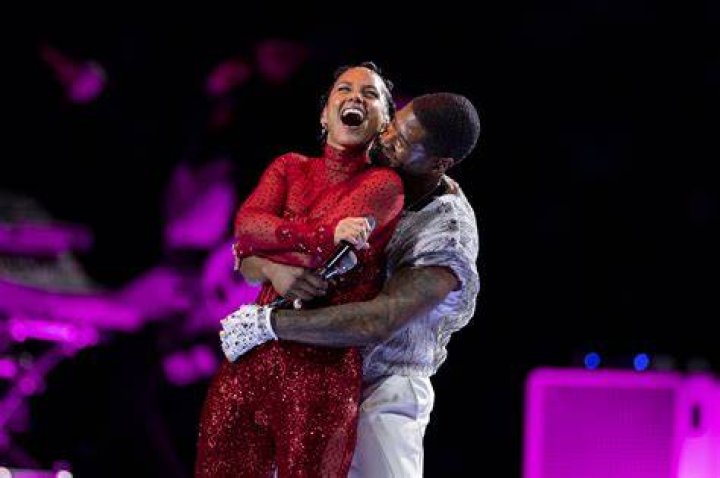 Alicia Keys and Usher perform onstage during the Apple Music Super Bowl LVIII Halftime Show at Allegiant Stadium on February 11, 2024 in Las Vegas, Nevada. (Photo by Ethan Miller/Getty Images) 